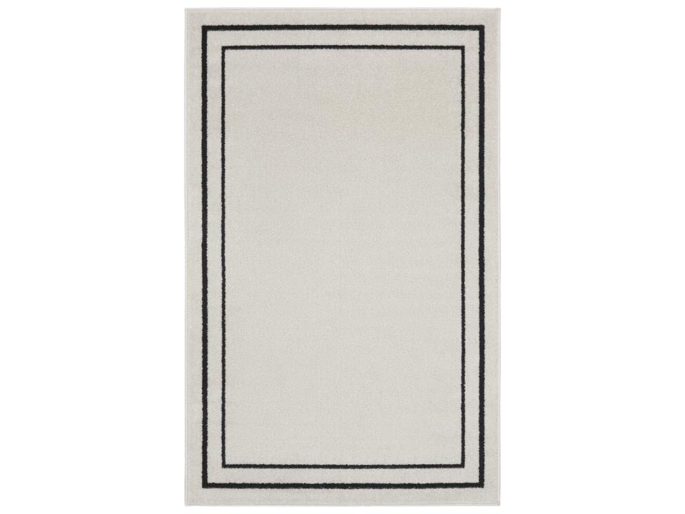 Essentials Bordered Indoor Outdoor Area Rug in Ivory and Black
