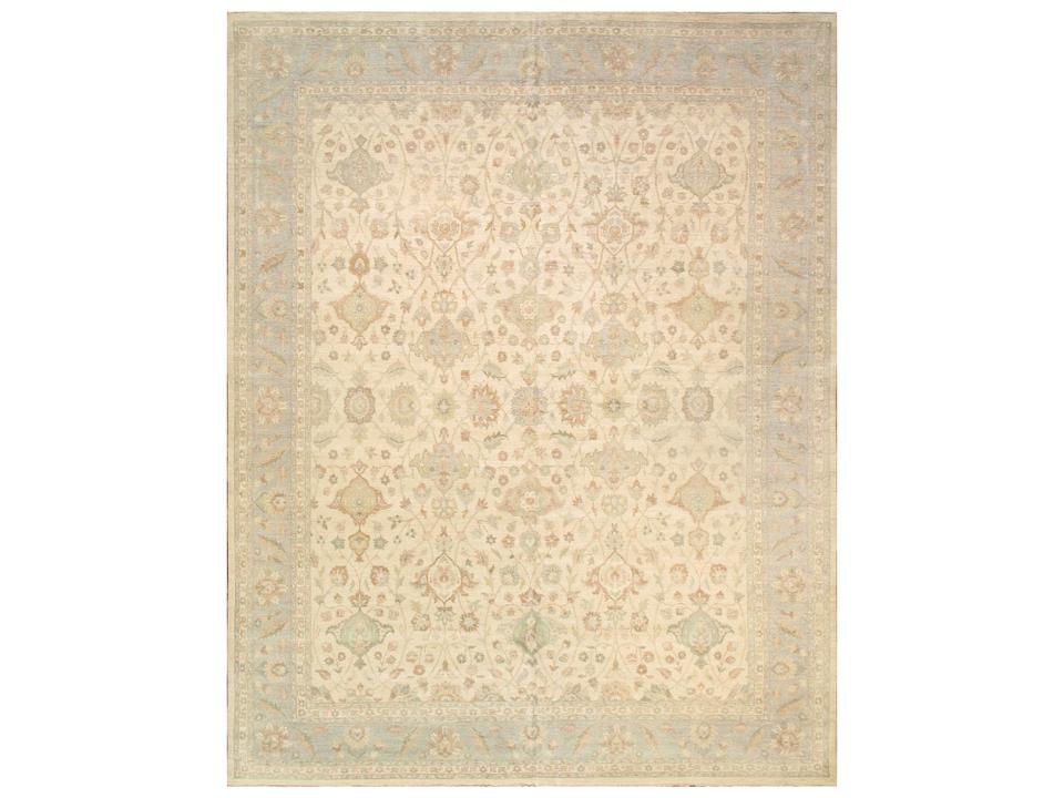 Melody Bordered Hand-Knotted Lamb's Wool Area Rug in Ivory Light Blue