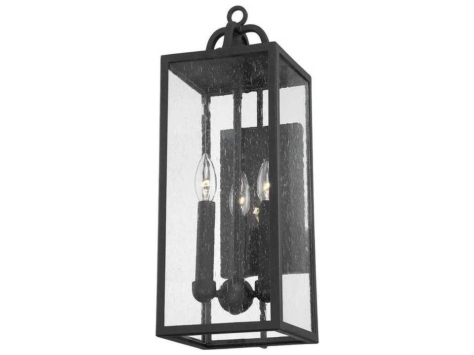 Caiden 3-Light Outdoor Wall Sconce in Forged Iron and Seeded Glass