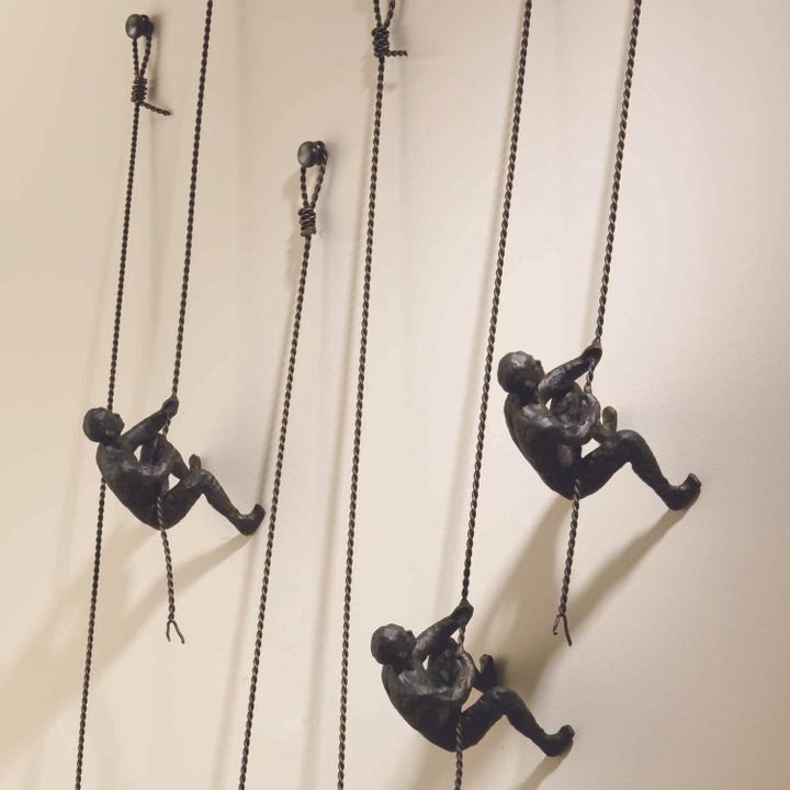 Climbing Man Wall Sculpture in Bronze Cast Iron